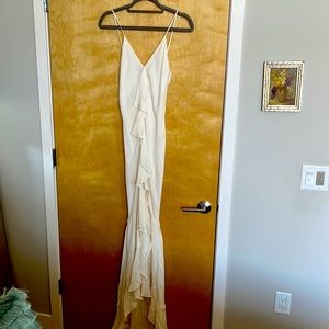 Never worn but without tags. Fitted through the knees.